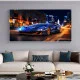 Tablou Auto Fiorul Vitezei – Canvas Decorativ Stil Cyberpunk cu Supercar Albastru
