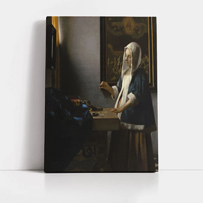 Femeie tinand o balanta - Reproduceri pictori celebri