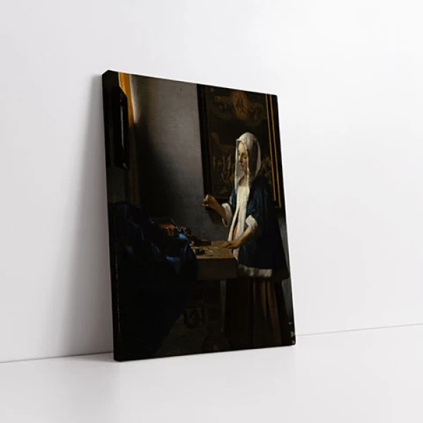 Femeie tinand o balanta - Reproduceri pictori celebri